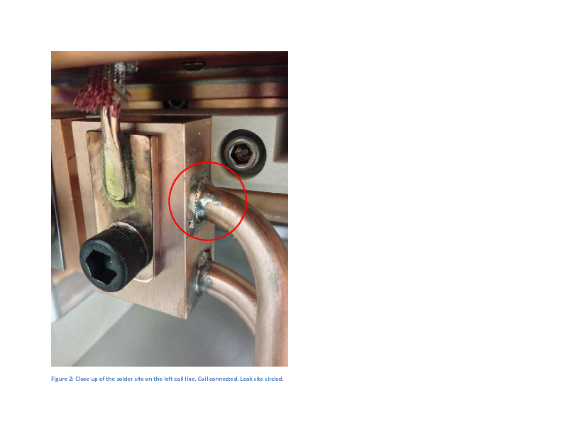 TM2_Source_Tray_in_Test_Stand_FEBIAD_Coil_Water_Leak.pdf