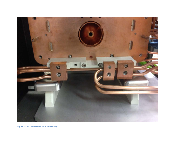 TM2_Source_Tray_in_Test_Stand_FEBIAD_Coil_Water_Leak.pdf